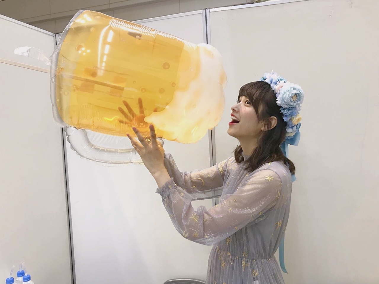 Kumi with a huge inflatable beer jug